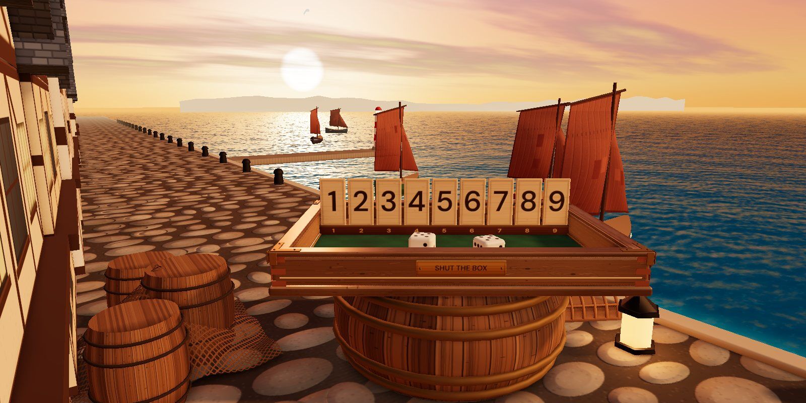The Shut the Box on its barrel on the quay at sunset, with fishing boats behind