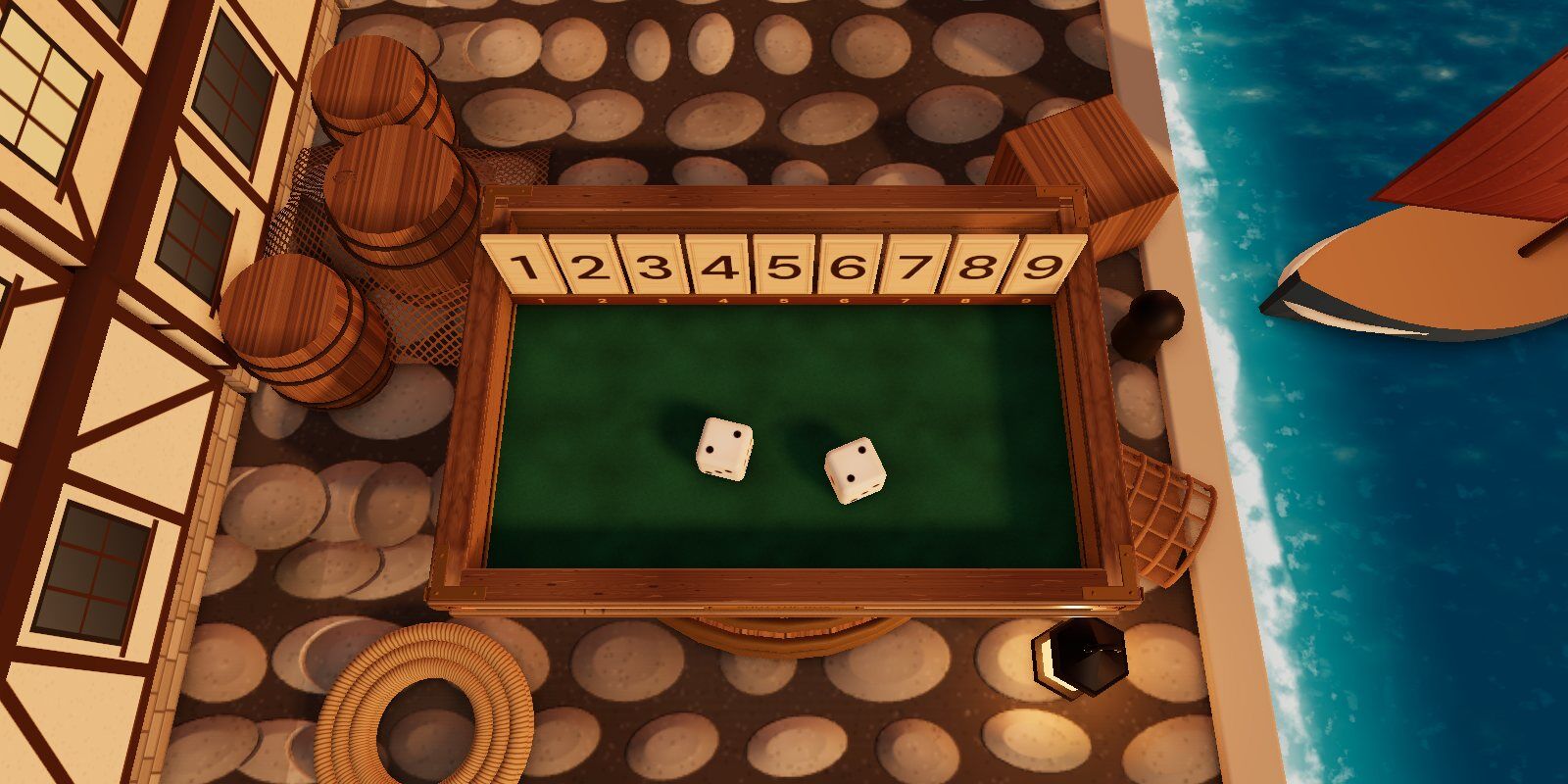 A Shut the Box seen from above on the cobbled quay